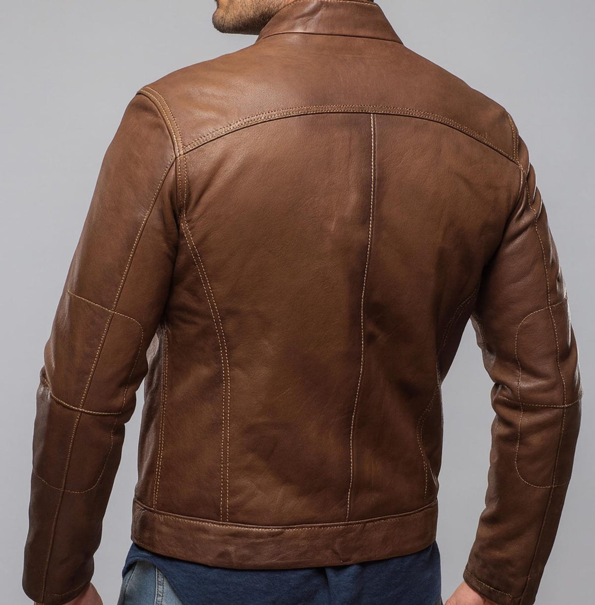 Caramel Brown Sheep Leather Bomber Jacket | Daaran – close-up of leather texture and stitching