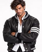 Men's black leather varsity jacket crossed arms view